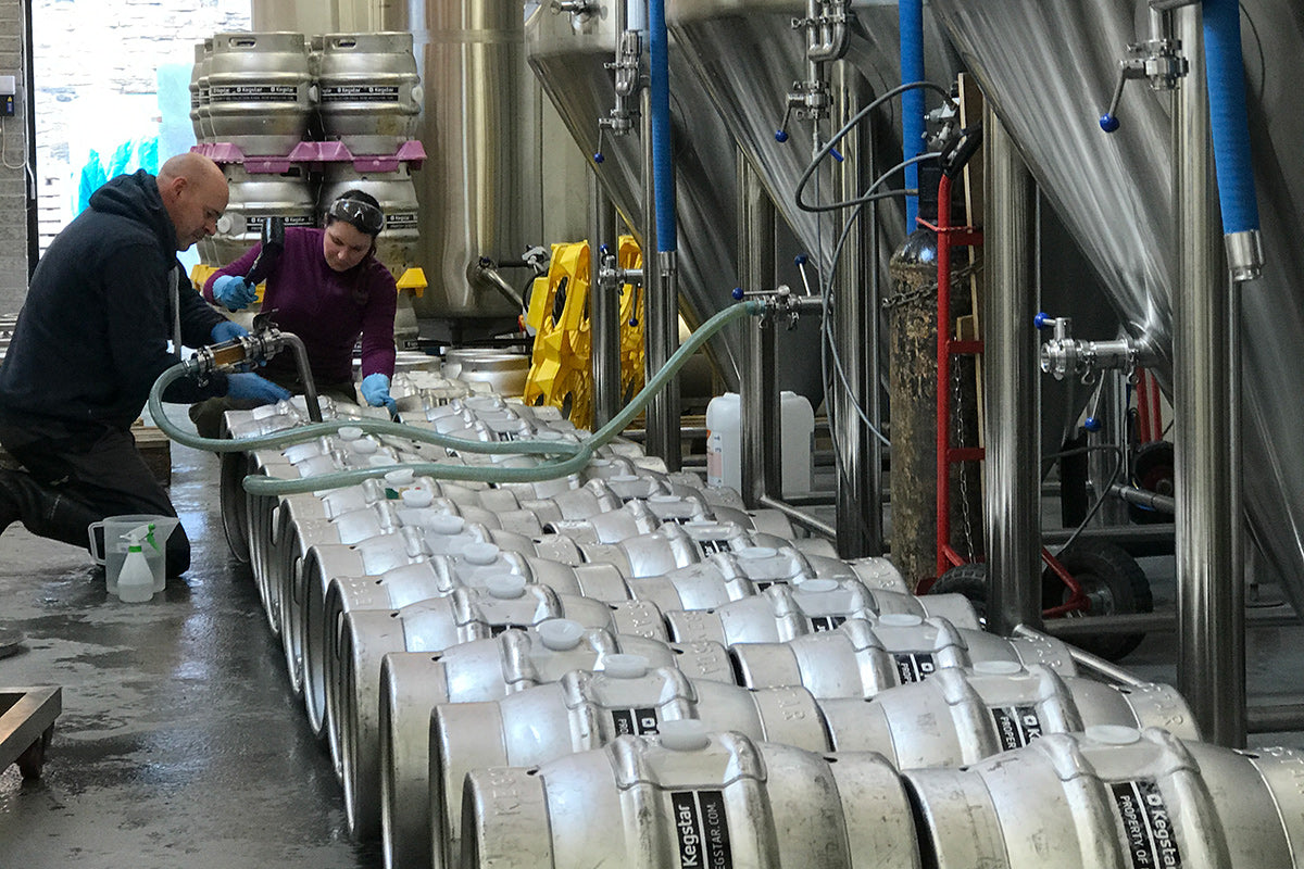 Kieran and Sally filling casks, pre-lockdown.