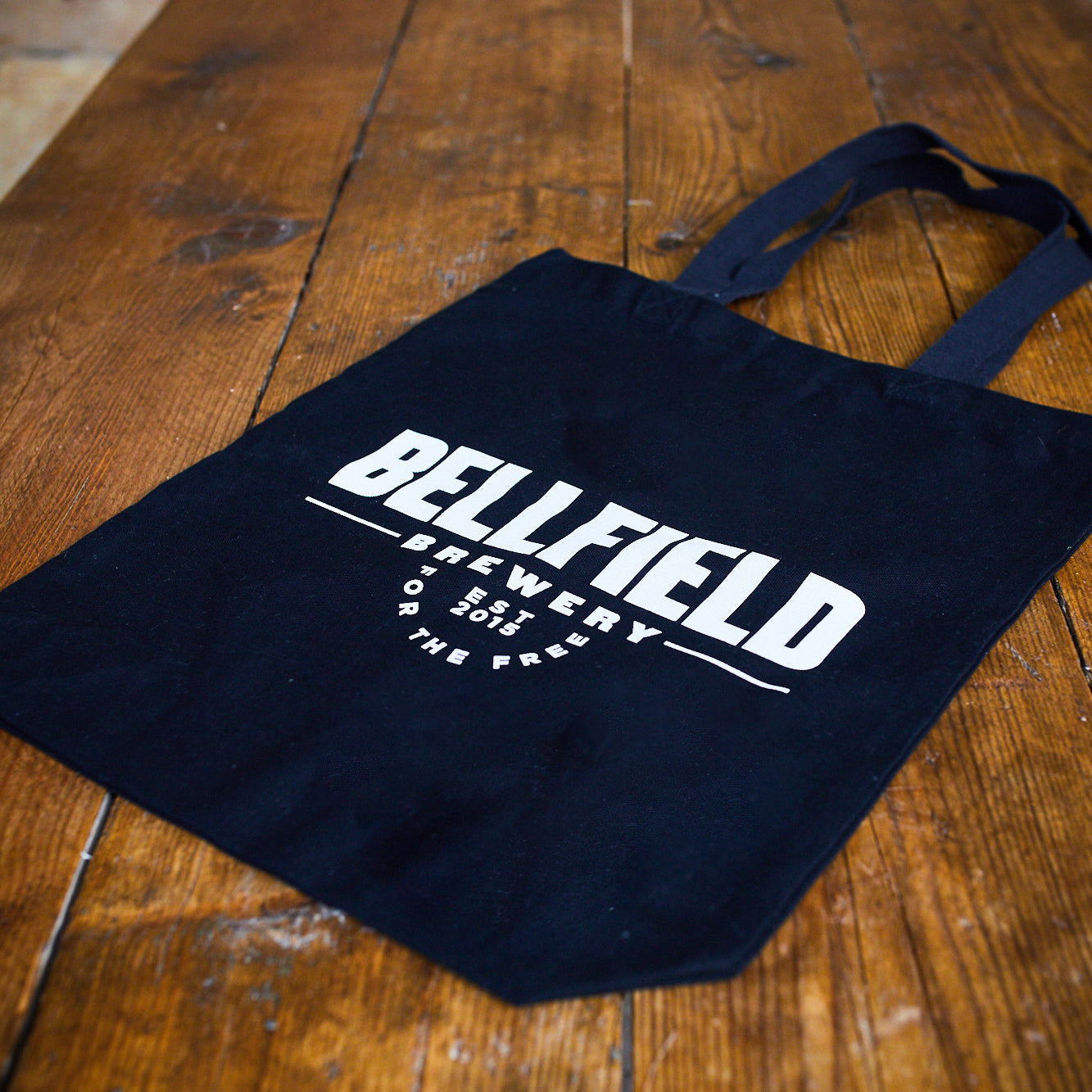 Bellfield branded cloth tote bag.