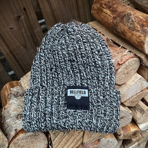 A black & white Bellfield beanie hat.