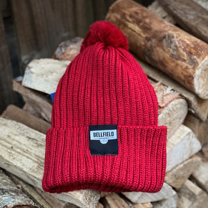 A red Bellfield beanie hat.